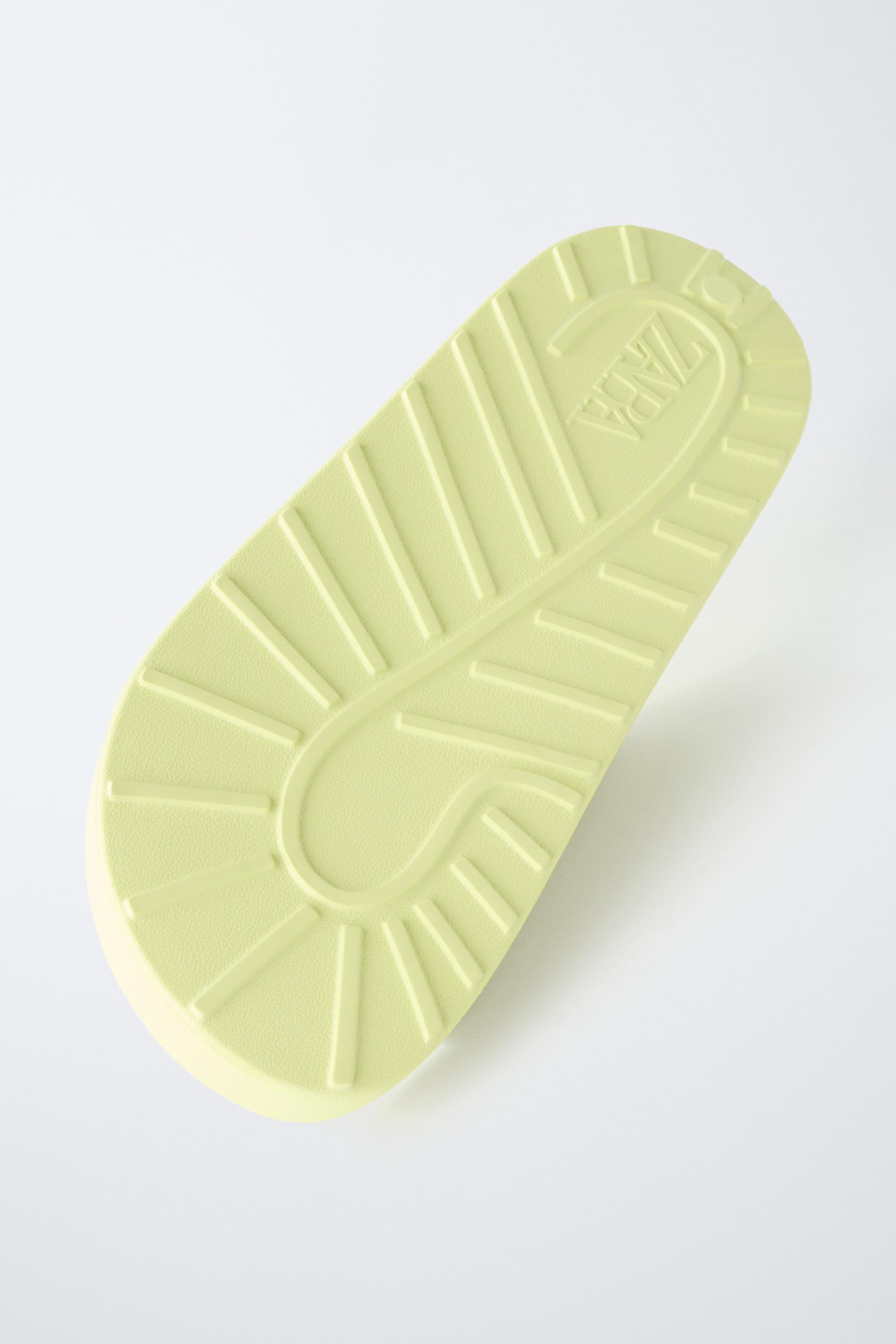 RUBBERIZED BUCKLED SANDALS